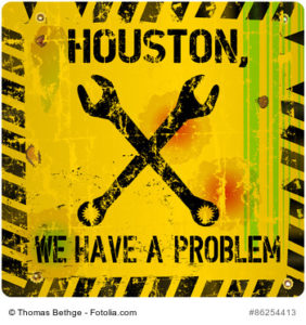 Schild mit Aufschrift "Houston, we have a problem"